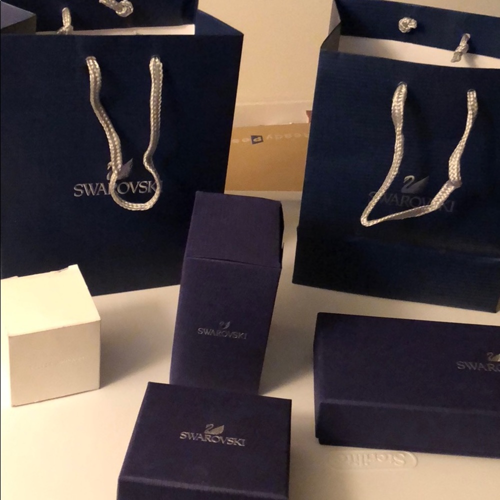 4 Swarovski Boxes and 2 bags
